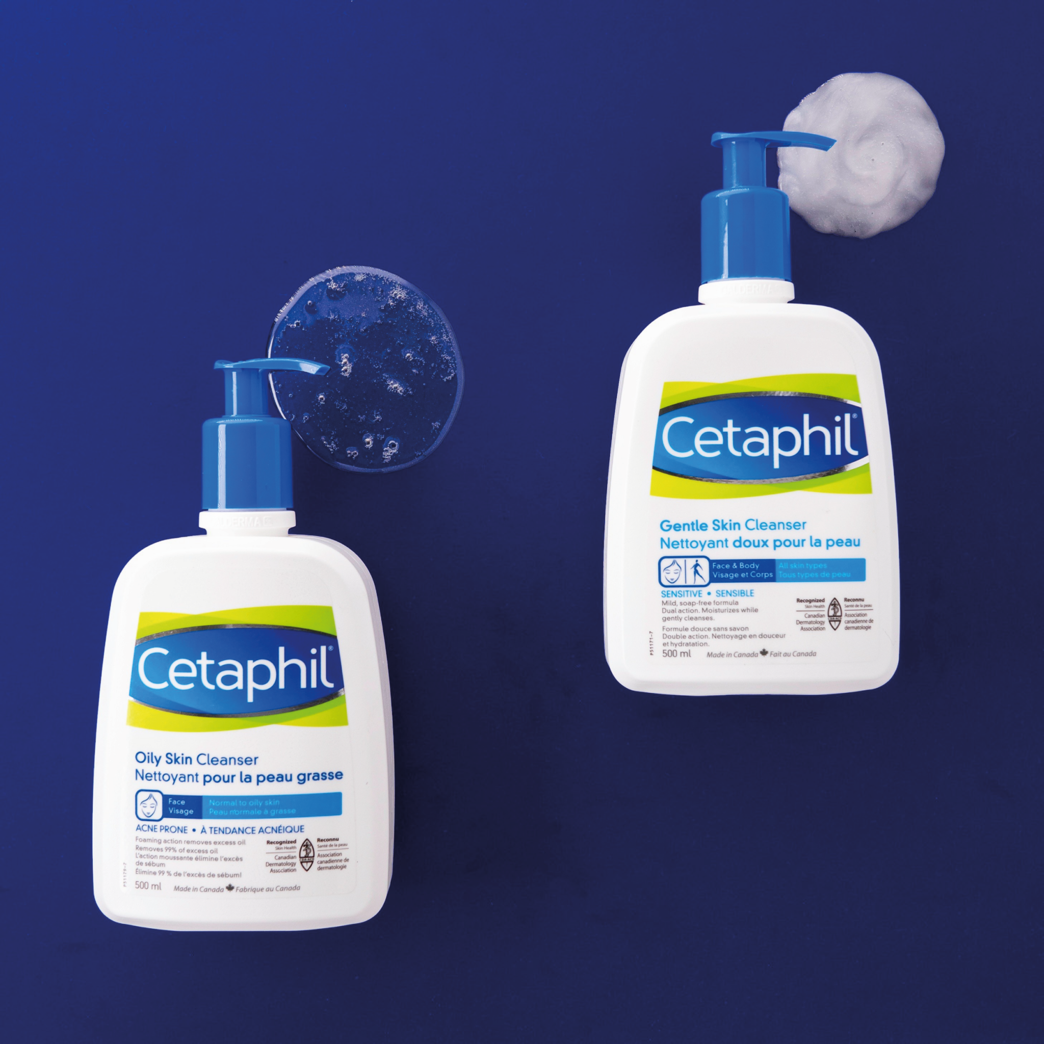 Two bottles of Cetaphil hand soap on a blue surface.