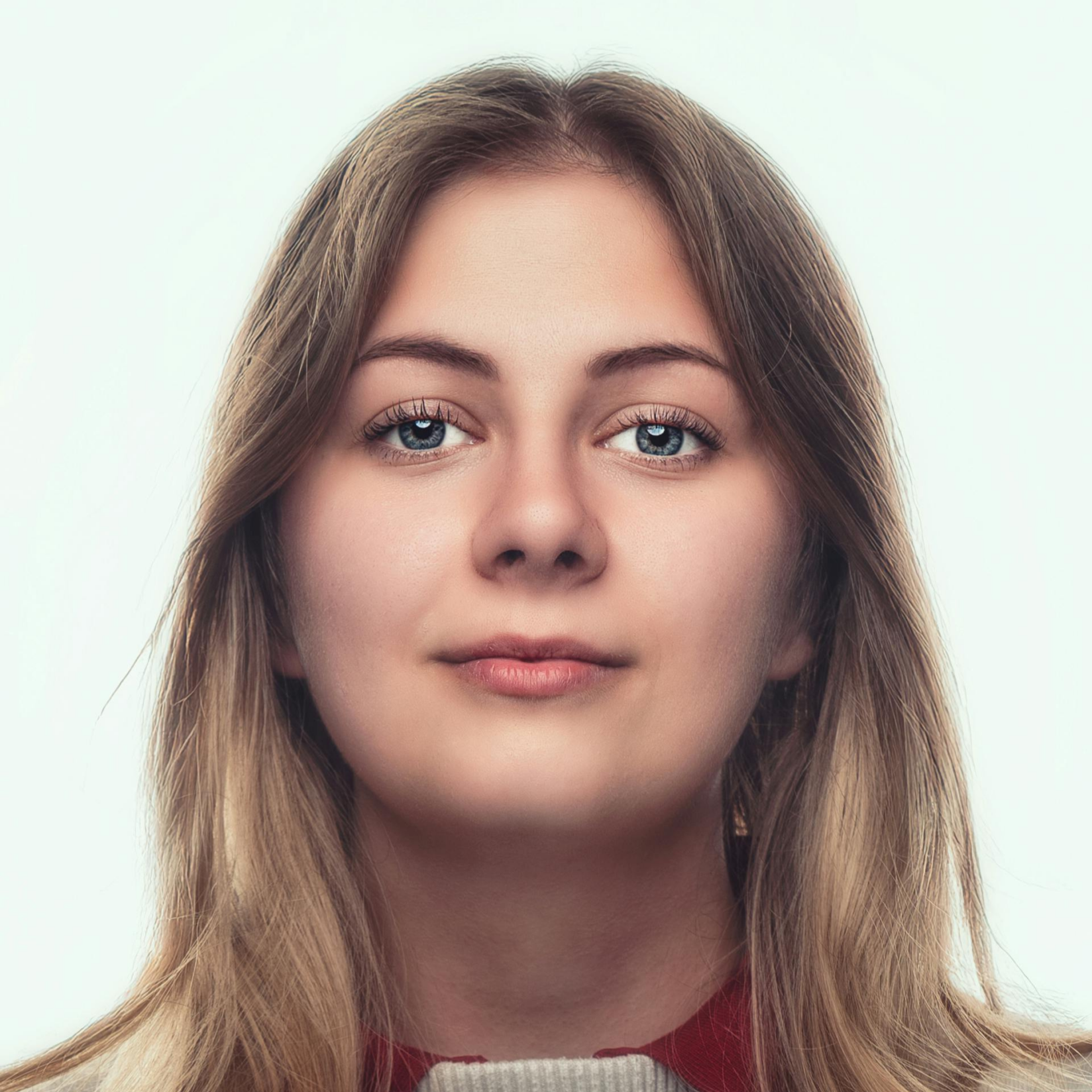 AI-generated portrait of a young woman against a plain background, representing synthetic creators used in AI-generated UGC campaigns